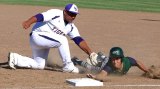 Lemoore's Roger Kaalekahi tags out El Diamante High's James Sierra in Tuesday's game in Lemoor which the Tigers lost 4-2.